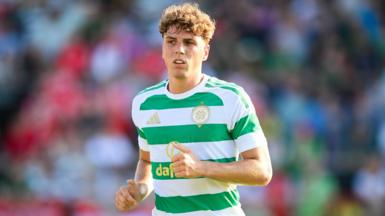 Arne Engels in action for Celtic, wearing a jersey with green and white hoops