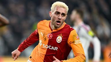 Galatasaray's Baris Yilmaz celebrates after scoring the team's second goal against Juventus