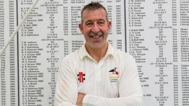 Nigel Martyn in front of the England honours board at Loughborough 