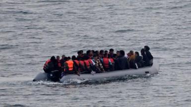 Migrants in inflatable dinghy in English Channel 