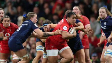 Sisilia Tuipulotu carries the ball for Wales
