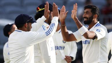 India's Jasprit Bumrah celebrates an Australia wicket on day one of the first Test in Perth