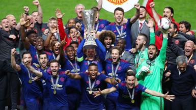 Manchester United lift the Europa League trophy