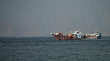 Two vessels at the Strait of Hormuz, taken from Musandam, Oman
