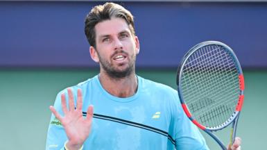 Cameron Norrie waves to the crowd after beating Alex de Minaur at the Canadian Open