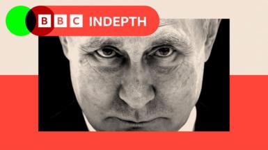 A black and white close-up of Vladimir Putin's face. He has a quizzical look on his face. There is a red border at the bottom and a green dot on the left.