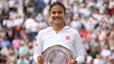 Emma Raducanu poses with her Queen's runner-up trophy 