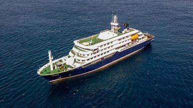 Aerial picture of a general view of the cruise ship MV Hondius stationary off the port of Praia, the capital of Cape Verde.