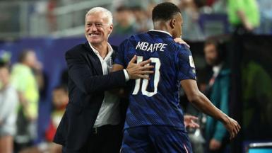 An image of Didier Deschamps and Kylian Mbappe hugging during the World Cup 2026
