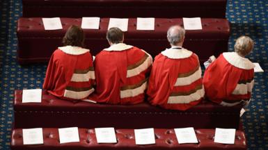 Peers find their places in the House of Lords before the State Opening Of Parliament at Houses of Parliament in 2017