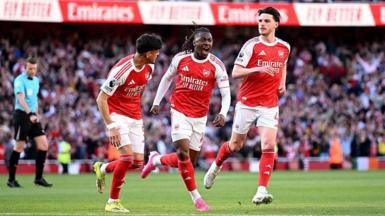 Arsenal celebrate scoring against Newcastle