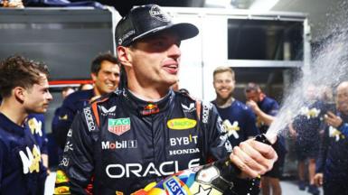 Max Verstappen sprays champagne in celebration after winning the world title at the Las Vegas Grand Prix