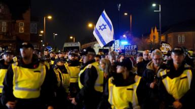 Pro Israel supporters are led away from Villa Park