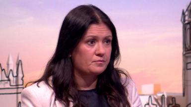 Lisa Nandy on the set of Sunday with Laura Kuenssberg - she has long dark hair and is wearing a pale jacket with a dark top underneath