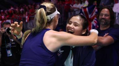 Katie Boulter hugs Emma Raducanu