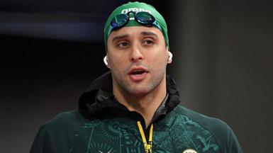 South Africa's Chad le Clos arrives for the Men's 50m Butterfly Semi-Final at the swimming event at the Tollcross International Swimming Centre in Glasgow, on day five of the Commonwealth Games 