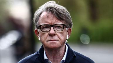 Former UK ambassador to the United States, Lord Peter Mandelson, is pictured as he walks his dog near his residence in central London on April 20, 2026