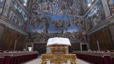 A view from the Sistine Chapel, specially arranged ahead of the Papal Conclave to elect the new pope as voting desks for the 133 cardinals have been placed beneath Michelangelo's frescoes.