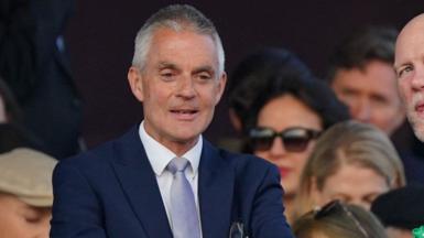 Tim Davie pictured in the Royal Box viewing the Coronation Concert held in the grounds of Windsor Castle