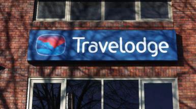 A Travelodge sign outside one of its hotels