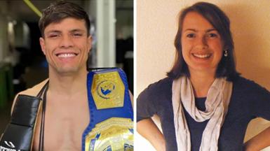 Man with boxer belt over shoulder and woman in blue top looking at camera
