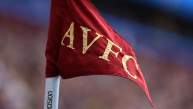A corner flag with the Aston Villa initials displayed on it