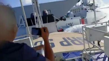 Chinese Coast Guard tailing very close to a Philippine vessel