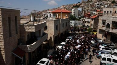 funeral procession for those killed in Majdal Shams, occupied Golan Heights