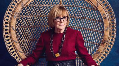 Anne Robinson sitting in a chair on the front cover of June's Saga magazine
