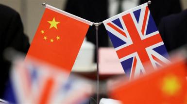 A Chinese and UK flag
