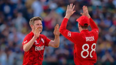 England's Liam Dawson and Harry Brook celebrate a wicket