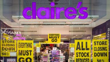 A general view of a Claire's store in central Cardiff on 11 February 2026 with big yellow posters in the window saying "Everything must go", "All stock reduced" and "Store closing down 50% off".