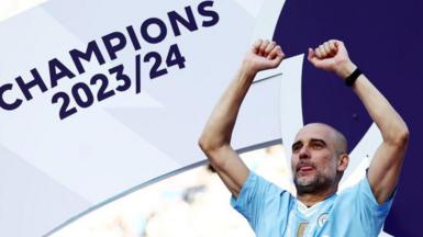 Manchester City manager Pep Guardiola celebrates a fourth successive title