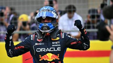 Max Verstappen pumps his arms in celebration after winning the US Grand Prix sprint race