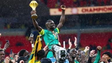 Senegal captain Sadio Mane celebrates winning Afcon