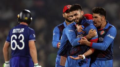 Naveen-ul-Haq celebrates Jos Buttler wicket
