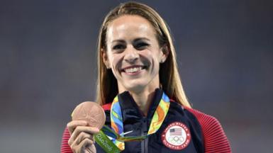USA's Jennifer Simpson holds up her bronze medal from the women's 1500m at the Rio 2016 Olympic Games