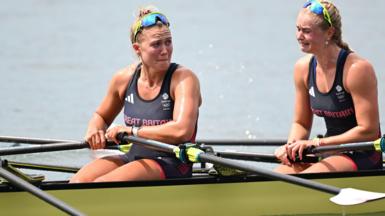 Lola Anderson and Hannah Scott show their emotions after winning the women's quadruple sculls for Great Britain