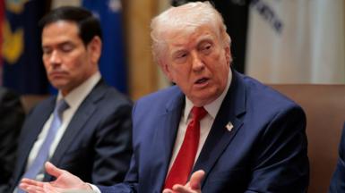 Marco Rubio, US secretary of state, left, and US President Donald Trump during a cabinet meeting at the White House