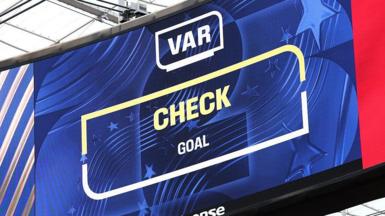 The big screen displays the VAR review after Iran's goal during the FIFA World Cup 2026 Group G match between Belgium and IR Iran at Los Angeles Stadium on June 21, 2026 in Inglewood, California.