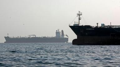 Two ships seen in the Strait of Hormuz.