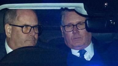 Close up image of Keir Starmer and a driver both inside a car that left Downing Street on 9 February.