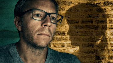 Greg Squire in grey v-neck t-shirt and glasses, next to a treated image of a brick wall and a girl's silhouette