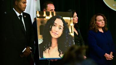 A portrait of the late Celeste Rivas Hernandez is shown during a press briefing by Los Angeles County District Attorney Nathan J. Hochman (out of frame) on the case against singer D4vd in Los Angeles, on April 20, 2026. 