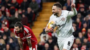 Dominik Szoboszlai reacts to an error that gifts Adam Phillips a goal for Barnsley at Liverpool