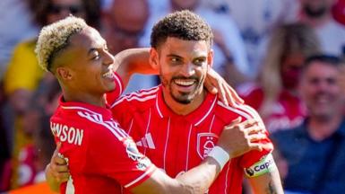 Omari Hutchinson and Morgan Gibbs-White hug in celebration