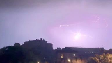 Lightning flashes over Edinburgh Castle