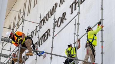 Workers prepare scaffolding in Washington DC on 13 June 2026