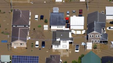 An aerial view of a flooded area of residential houses after heavy rain in Oamishirasato, Chiba Prefecture, Japan, 14th August 2026