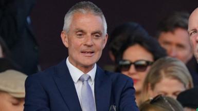 Tim Davie pictured in the Royal Box viewing the Coronation Concert held in the grounds of Windsor Castle